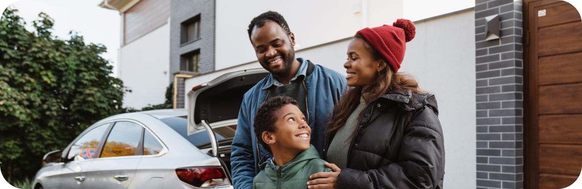 family smiling at each other