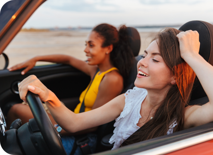 friends enjoying a car ride